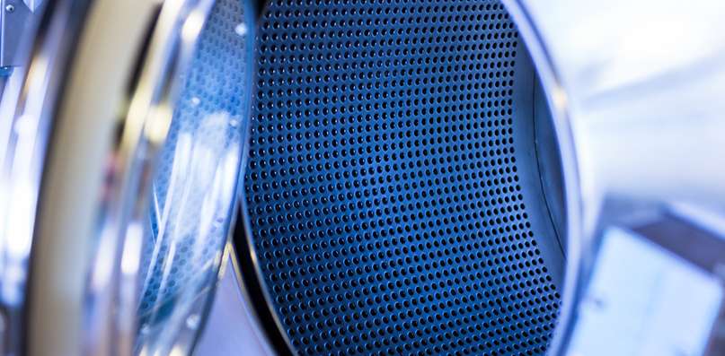 perforated metal interior of an appliance
