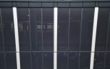 Perforated Metal on a parking garage