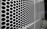 a close up of perforated metal