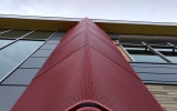 Perforated Radius Forming Facade