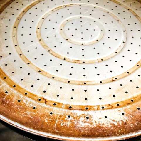 A perforated sheet pan