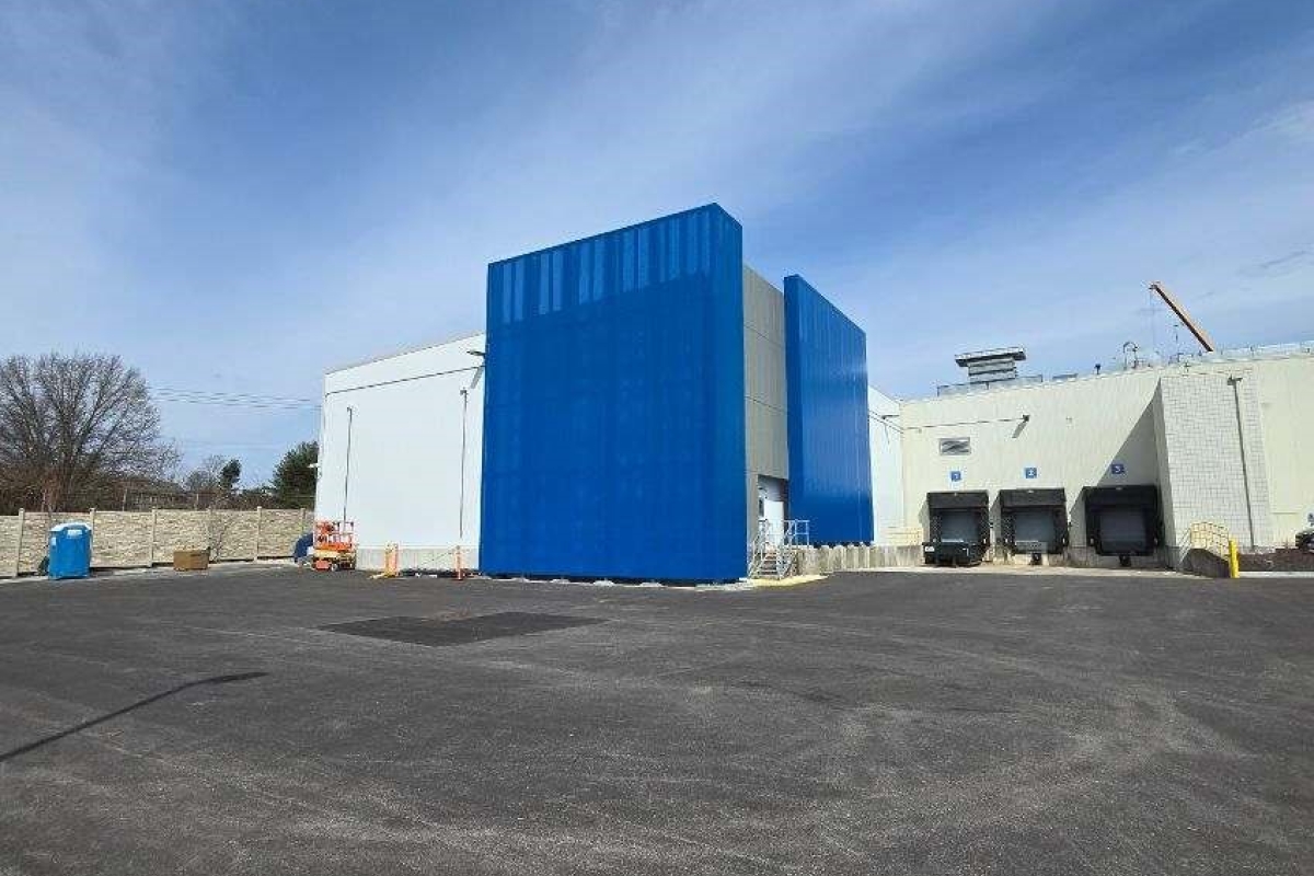 Blue perforated screening on an office building