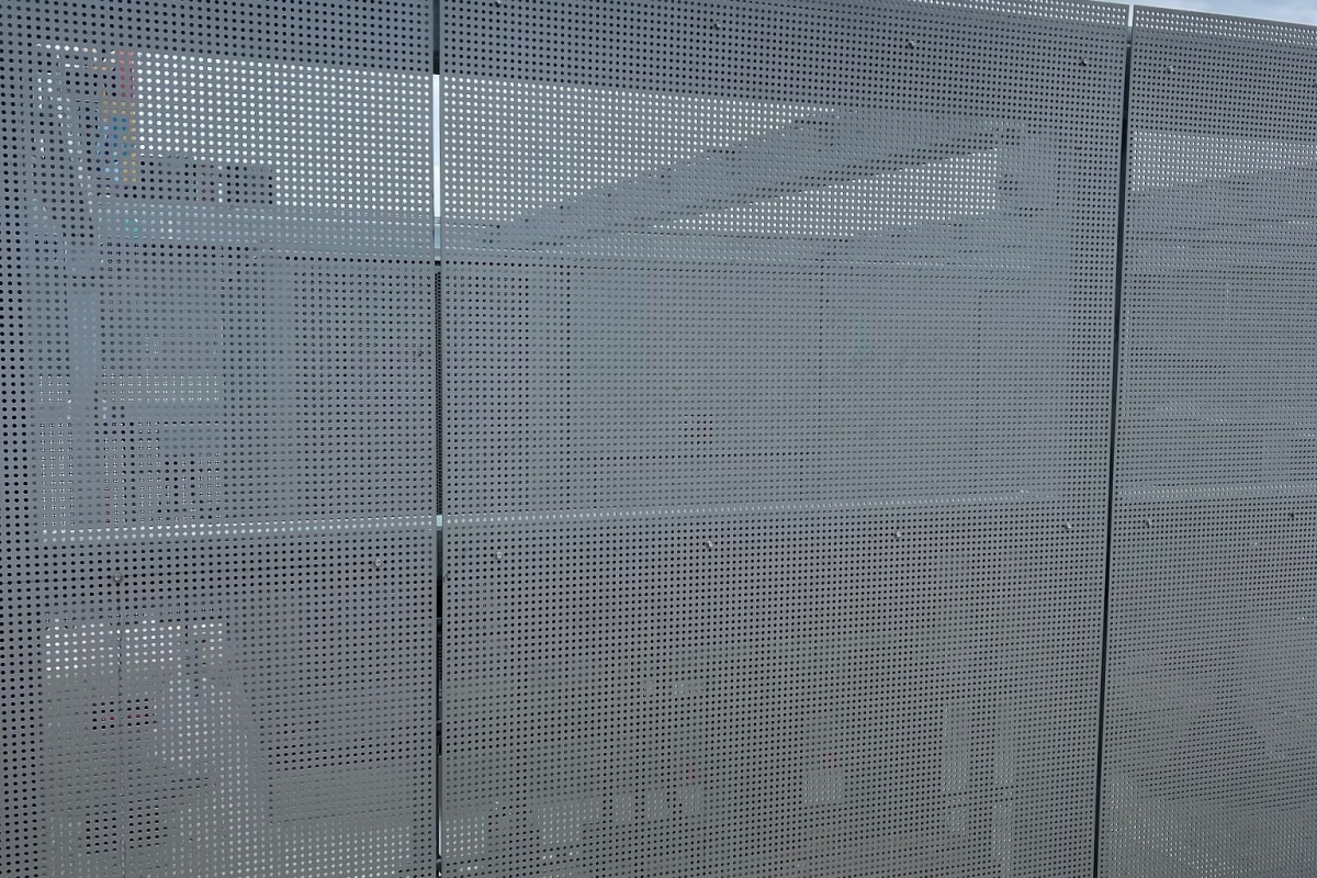 Perf metal surrounding A/C Unit San Diego