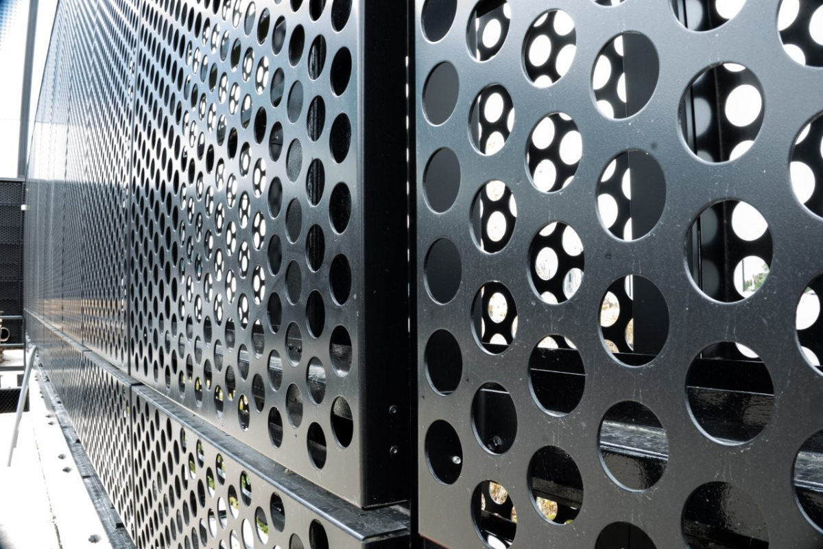 A close up of large holes painted black