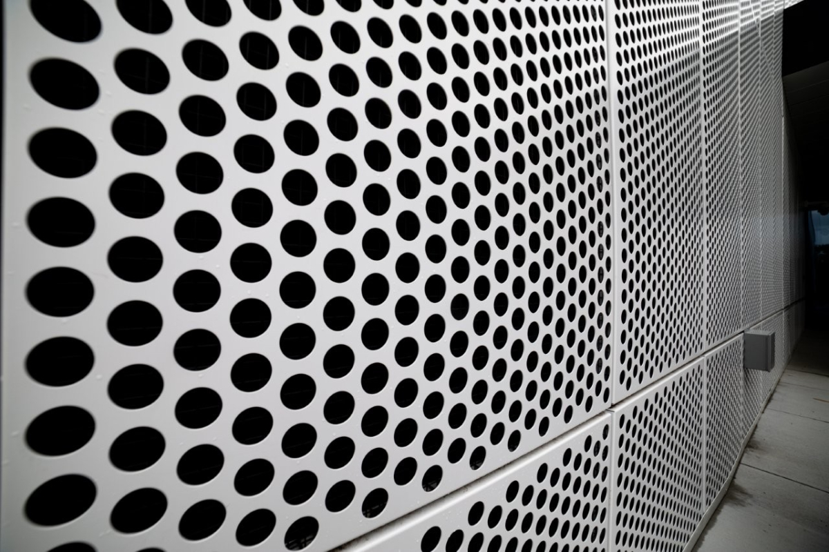 a close up of perforated metal