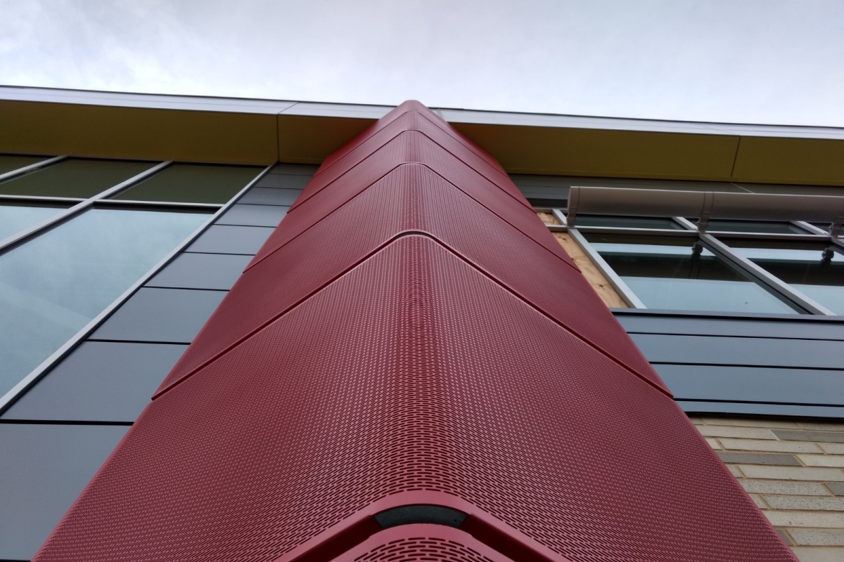 Perforated Radius Forming Facade