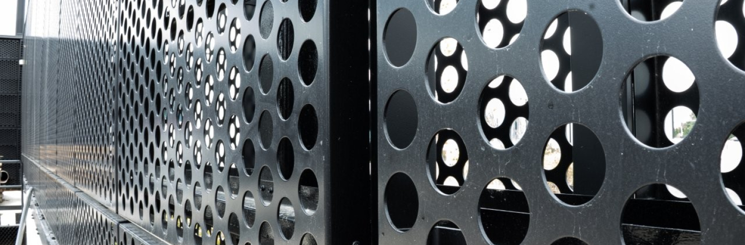 A close up of large holes painted black