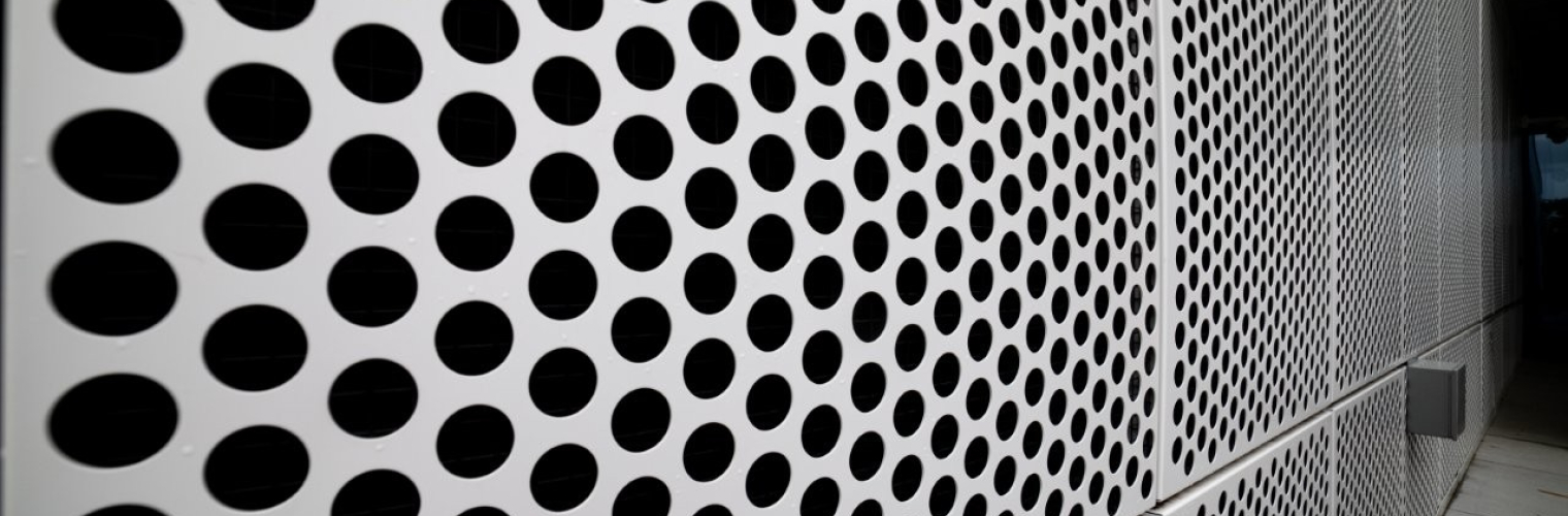 a close up of perforated metal