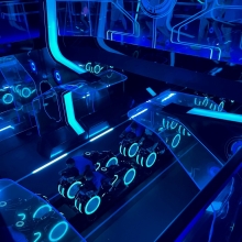 The cars at Tron Lightcycle run